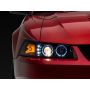 Raxiom 99-04 Ford Mustang Dual LED Halo Projector Headlights- Black Housing (Clear Lens)