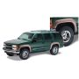 Bushwacker 97-99 Chevy Tahoe OE Style Flares 4pc 4-Door Only - Black