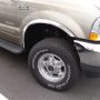 Putco 97216 99-07 Ford SuperDuty Pickup - Full Stainless Steel Fender Trim