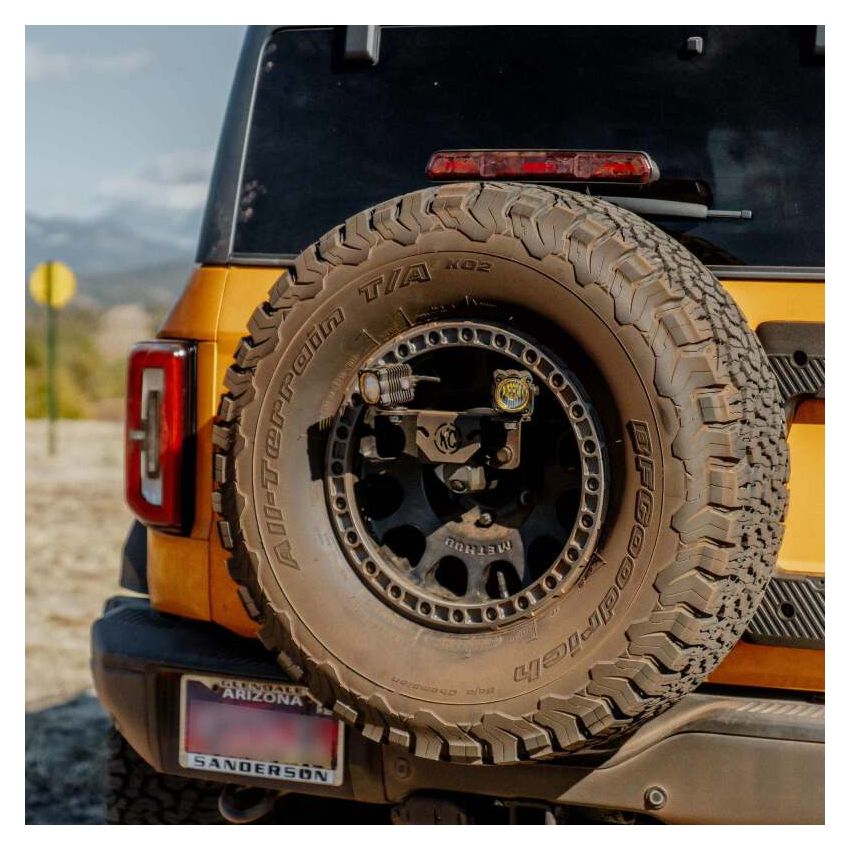 KC HiLiTES 7478 Spr Tir Carr (M14x1.5 Lug) - 18+ Jeep Wrangler JL /21+ Ford Bronco Raptor