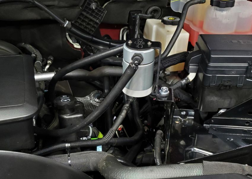 J&L 20-21 Chevy Silverado/GMC Sierra 2500/3500 6.6L Drivers Side Oil Separator 3.0 - Clear Anodized