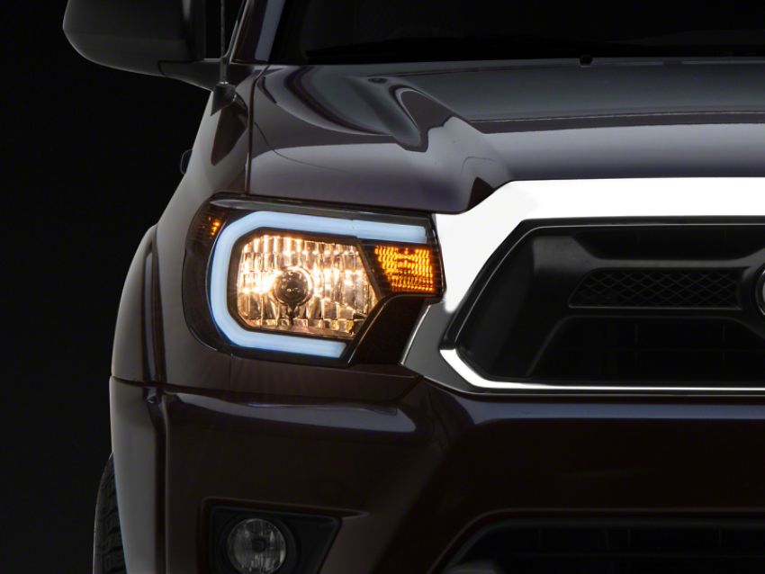 Raxiom TT21847 12-15 Toyota Tacoma Axial Series Headlights w/ LED Bar- Blk Housing (Clear Lens)