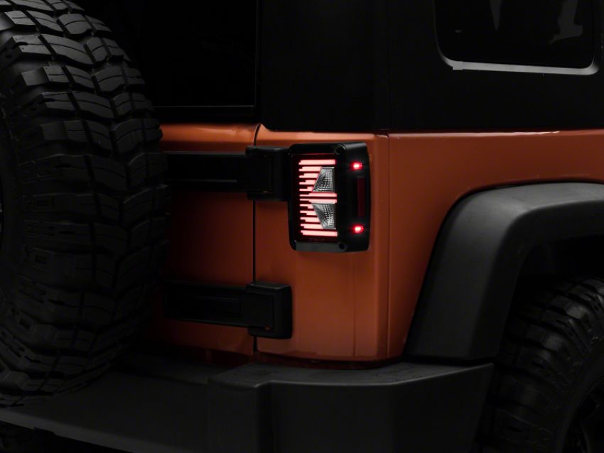 Raxiom J130809 07-18 Jeep Wrangler JK Axial Series Vision LED Tail Lights- Blk Housing (Clear Lens)