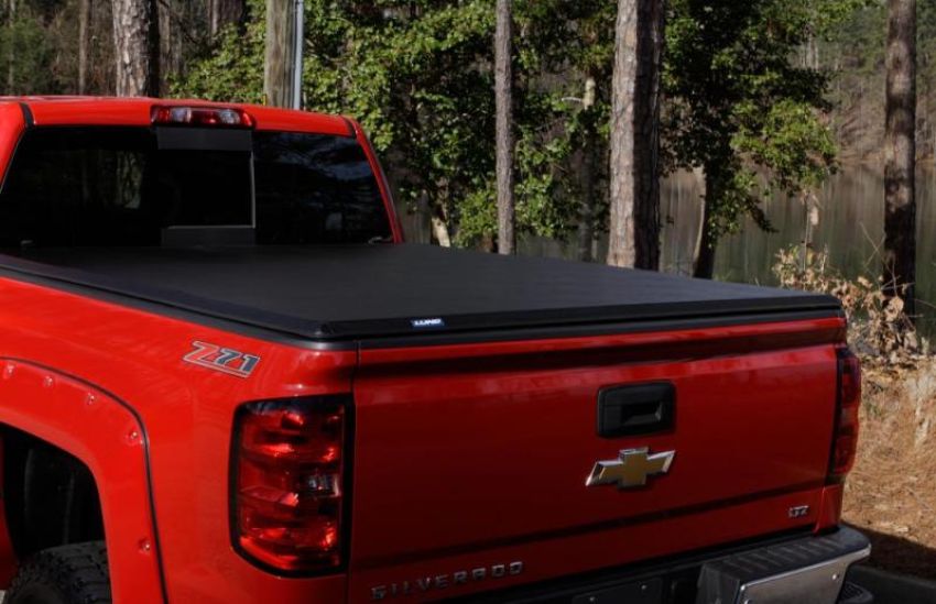 LUND 969364 15-18 Ford F-150 Styleside (5.5ft. Bed) Hard Fold Tonneau Cover - Black