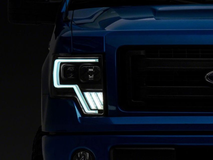 Raxiom T546755 09-14 Ford F-150 Axial G4 Light Bar Switchback Projector Headlights- Blk Housing (Clear Lens)