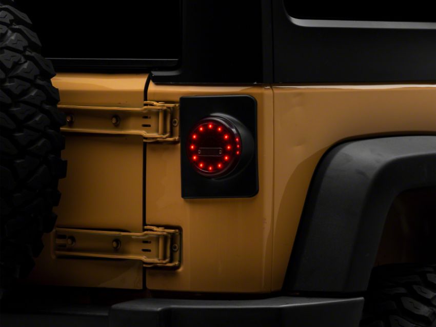Raxiom J164240 07-18 Jeep Wrangler JK Axial Series Halo LED Tail Lights- Blk Housing (Clear Lens)
