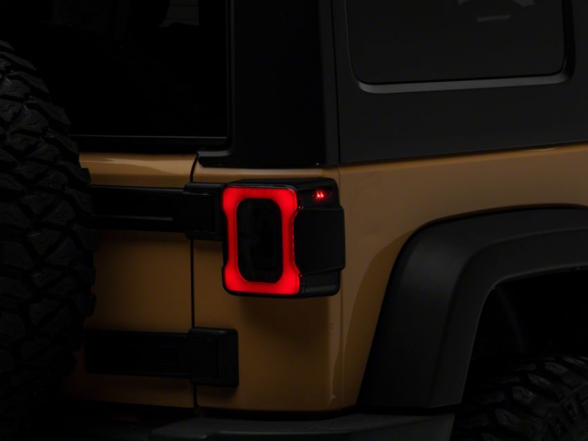 Raxiom J183262 07-18 Jeep Wrangler JK Axial Series LED Tail Lights- Blk Housing (Smoked Lens)