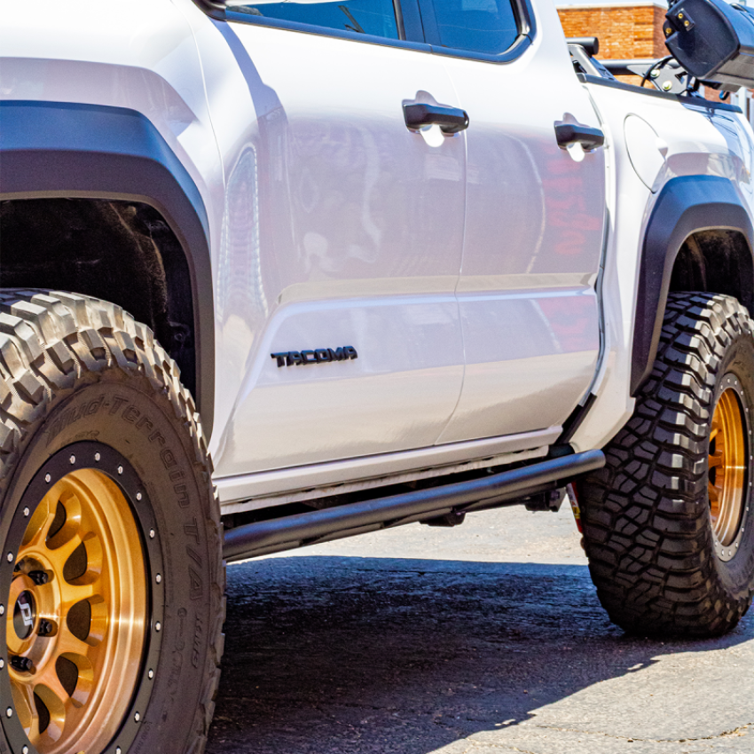 Cali Raised LED CR4069 Cali Raised 2024+ Toyota Tacoma Trail Edition Rock Sliders - Double Cab Long Bed / Kick Out / Raw