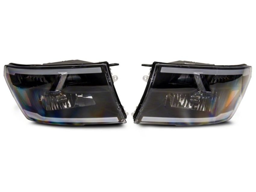 Raxiom R131481 09-18 Dodge RAM 1500/2500/3500 Axial Series Headlights w/ LED Bar- Blk Housing (Clear Lens)