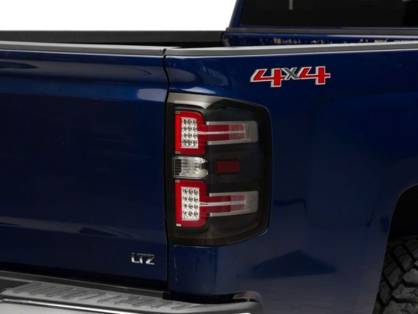 Raxiom S114457 14-18 Chevrolet Silverado 1500 LED Taillights w/ SEQL Turn Signals- Blk Housing (Clear Lens)