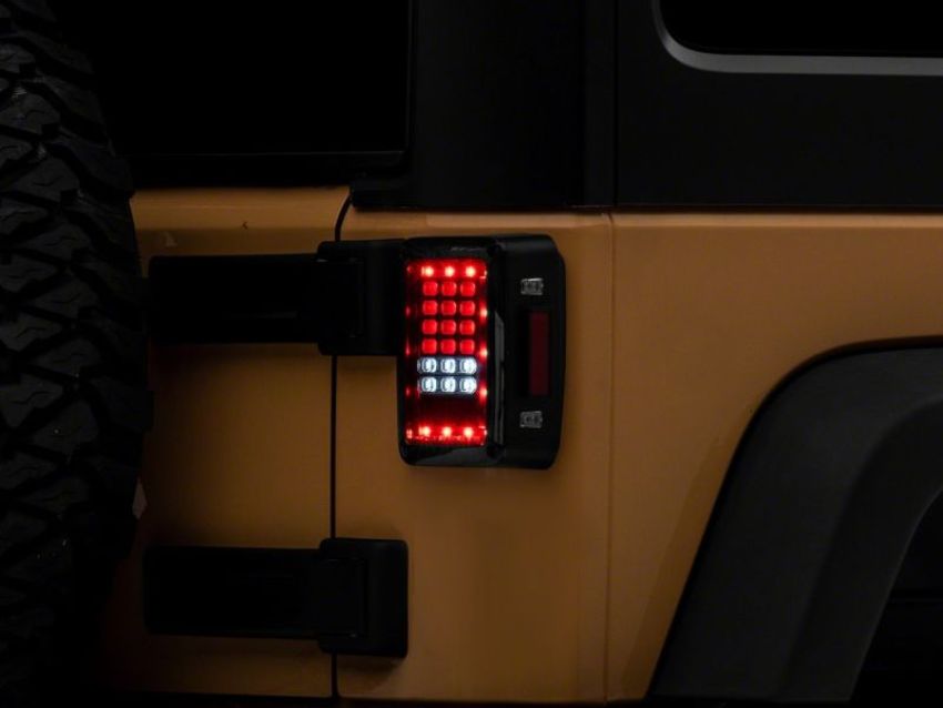 Raxiom J141585 07-18 Jeep Wrangler JK Axial Series LED Tail Lights- Blk Housing (Clear Lens)