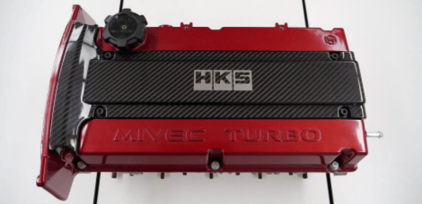 HKS 45999-AM002 CARBON PLUG COVER 4G63 (Lancer Evolution IV - IX)
