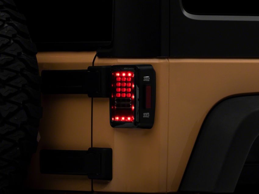 Raxiom J141585 07-18 Jeep Wrangler JK Axial Series LED Tail Lights- Blk Housing (Clear Lens)