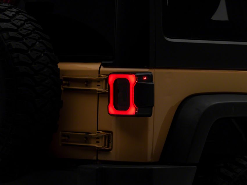 Raxiom J164241 07-18 Jeep Wrangler JK Axial Series Carver LED Tail Lights- Blk Housing (Smoked Lens)