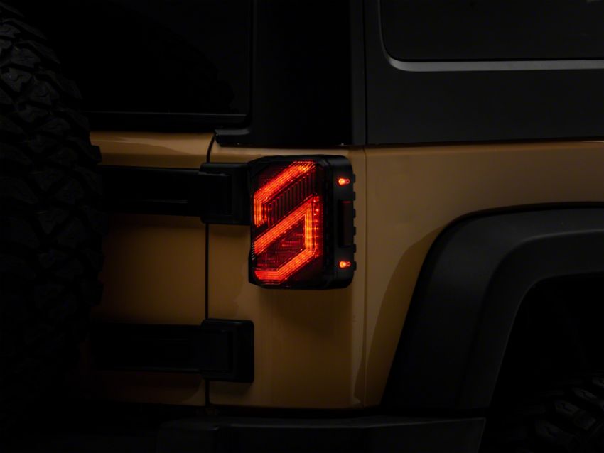 Raxiom J173719 07-18 Jeep Wrangler JK Axial Series Trident LED Tail Lights- Blk Housing (Clear Lens)