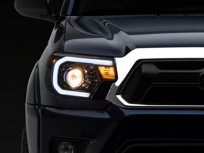 Raxiom TT21849 12-15 Toyota Tacoma Axial Series Projector Headlights w/ LED Bar- Blk Housing (Clear Lens)