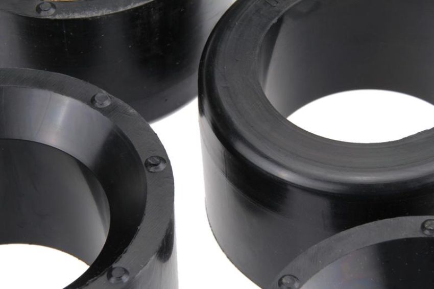 URO Parts 91133300900BHD Rear Spring Plate Bushing Set