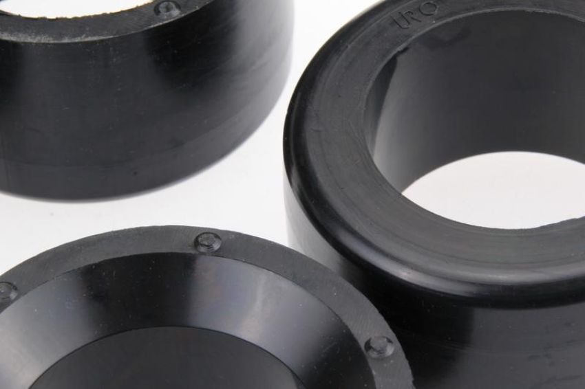 URO Parts 91133300900BHD Rear Spring Plate Bushing Set